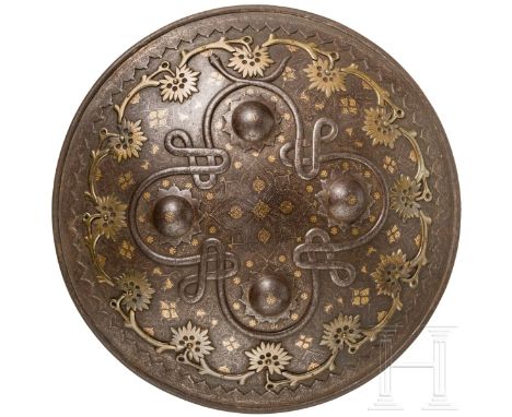 Gold- und silbertauschierter Rundschild (Dhal), Lahore, 19. Jhdt.  Kräftig gewölbter eiserner Schild mit nach außen gebördelt
