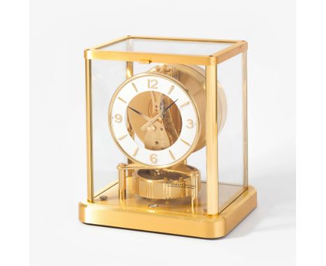   Atmos Jaeger-LeCoultre Nr. 602032 Schweiz, 2.Hälfte 20.Jh. Allseitig verglastes, vergoldetess Messinggehäuse. Weisser Ziffe