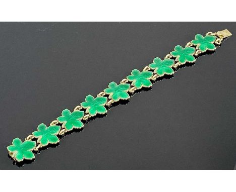 MEKA SILVER GILT & GREEN ENAMEL LEAF DESIGN 9 PANEL BRACELET, 1960s, 17.5cms (l)Provenance: private collection Flintshire