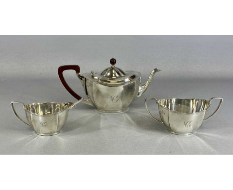 GEORGE V SILVER THREE-PIECE TEA SERVICE, oval panelled form, monogrammed 'C', teapot with polished wood handle and finial, Ba