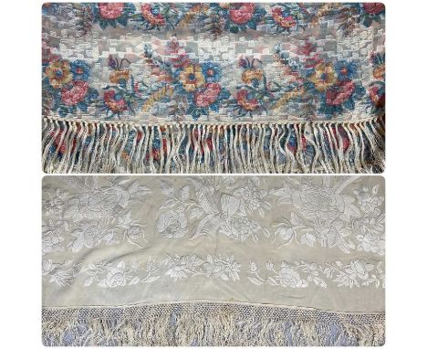 TWO VINTAGE SHAWLS, ivory silk with hand embroidery and fringed edging, approx. 144cms², and ivory silk with floral print and