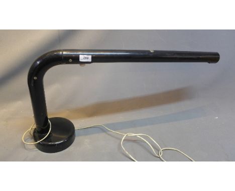 A 1970's Anders Pearson black ABS plastic tube desk lamp. H-39cm, W-78cm 