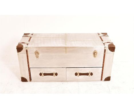 A Contemporary trunk in Andrew Martin Style. H: 51cm W: 111cm D: 40cm