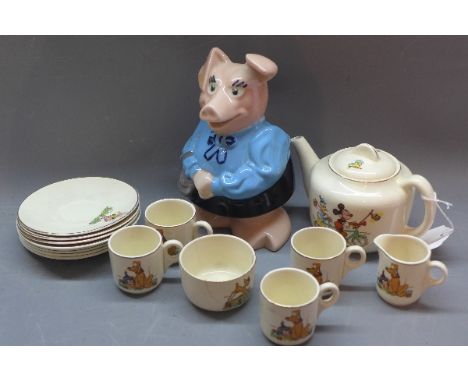 An early 20th Century Beswick ceramic tea set with Disney decoration (a/f), together with a Wade Natwest pig. 