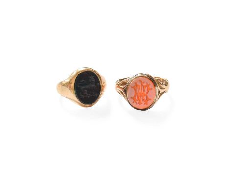 A 15 Carat Gold Hardstone Intaglio Signet Ring, finger size N1/2; and A 9 Carat Gold Bloodstone Intaglio Signet Ring, finger 
