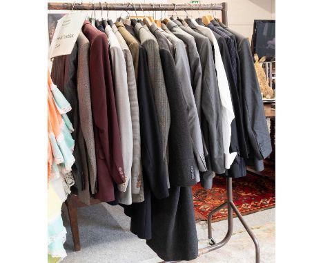 A Large Quantity of Mens Costume comprising of fourteen suits of various styles bearing the labels, Migee, Robert Old and Com