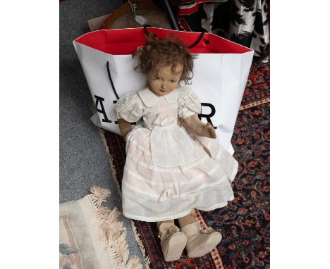 Large Chad Valley Jointed Fabric Doll wearing a white dress and cream felt bootees, a smaller Norah Wellings doll in original