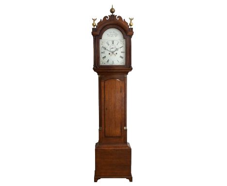 An Oak Eight Day Longcase Clock, signed John Pace, Bury St Edmunds, circa 1830, wavy shaped pediment with brass ball finials,