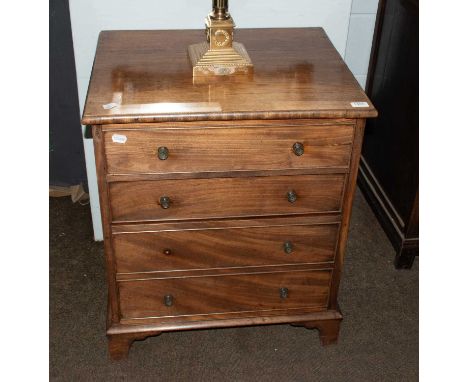 A 19th Century Mahogany Chest of Drawers, of small proportions, straight front and four height, 64cm by 52cm by 76cmTop with 