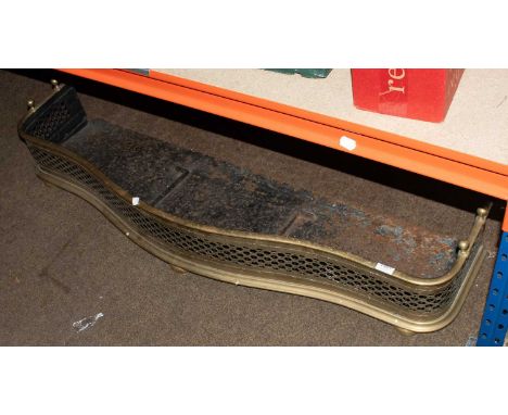 A Early 19th Century Pierced Brass Fire Fender, of serpentine form 136cm W