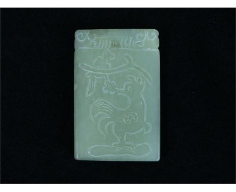  A mutton fat jade rectangular piece decorated with carved birds; 6.3 cm x 4 cm.
