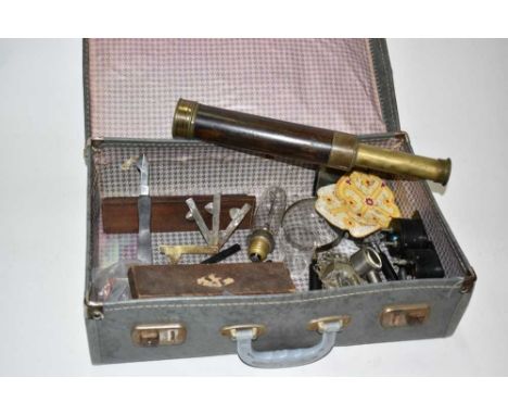 A case of sundries, including a brass three-drawer telescope by Fairey of Weymouth, a brass fleam by Joseph Rodgers, magnifie