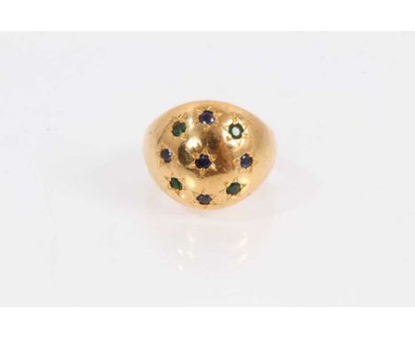 Eastern yellow metal dress ring set with sapphires and emeralds, size S½Total weight 30 grams. Ring is not marked. 