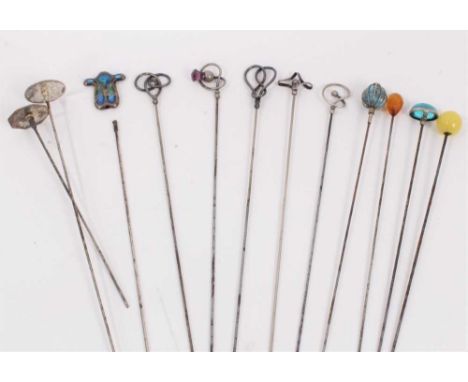 Collection of twelve vintage hat pins including five silver pins by Charles Horner, three enamelled pins and four set with ge