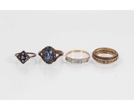 Four vintage 9ct gold gem set dress ringsTotal weight 9.3 grams 