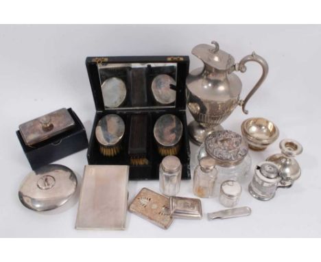 George VI silver cigarette case with engine turned decoration, (Birmingham 1947), silver topped vanity jars, candlestick and 