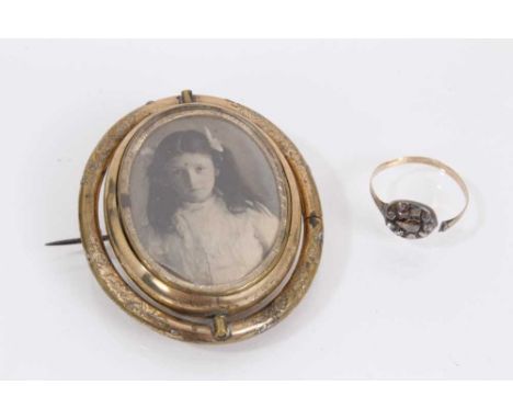 Georgian rose cut diamond cluster ring on later added shank (broken) and a Victorian gilt metal glazed locket brooch (2)