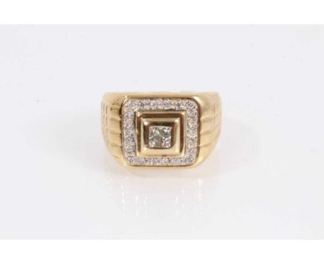 9ct gold large diamond set ring with a cluster of four princess cut diamonds to the centre, surrounded by a border of twenty 