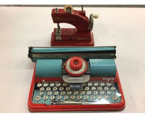 Box of toys including tin plate toy typewriter, Vulcan sewing machine, Beatrix Potter books, annuals and old roller skates.