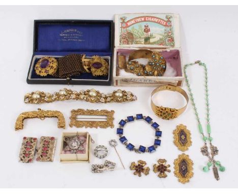 Group of Victorian gilt metal costume jewellery including bracelets, bangle, paste set star brooch/pendant, buckles, and othe