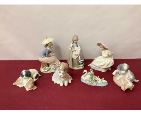 Six Nao porcelain figures and dogs, together with a Lladro swan with cygnets (7)