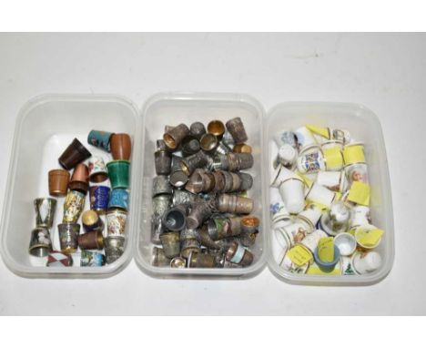 Collection of thimbles, including silver, enamel and porcelain