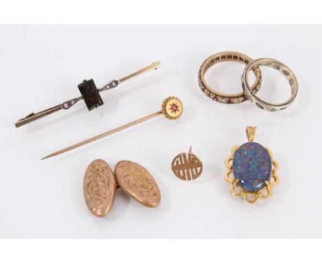 Group of gold jewellery to include yellow metal pin stamped 14k, Victorian 9ct gold stick pin, two 9ct gold gem set eternity 