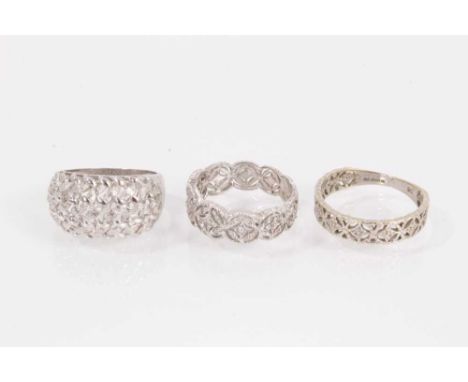 Three 9ct white gold rings all with cut out designs Total weight 9.8 gramsRing sizes (from left to right in the main photogra