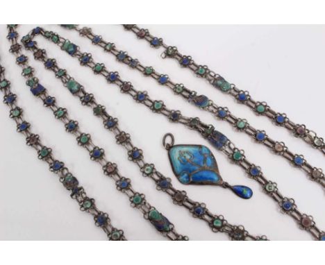 Art Nouveau silver and enamel drop pendant, 4.5cm, and long chain with enamelled flower head links, 134cmOverall condition is