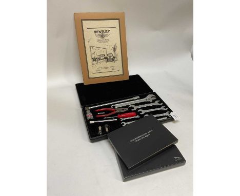 Jaguar owners tool kit, together with Jaguar owners pack and a vintage Bentley advert (3)