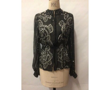 Designer Thea Porter Couture 1970s black crepe chiffon evening top with gathered waist and wide sleeves with cuffs, size 8, 1