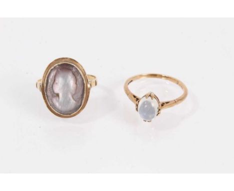 9ct gold moonstone cabochon ring, size P½ and yellow metal carved mother of pearl cameo ring, size N (2)9ct gold moonstone ri