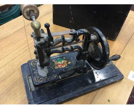 Vintage 1869 patent hand sewing machine with cover