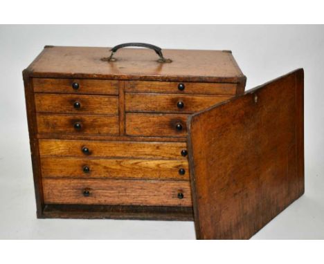 Oak travelling tool chest containing precision tools and instruments