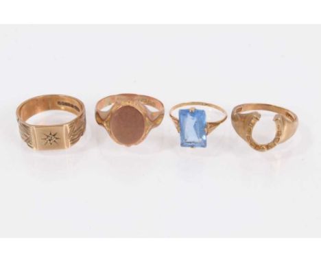 Four 9ct gold rings to include two signet rings, horseshoe ring and vintage blue stone ring Total weight 11.1 grams 