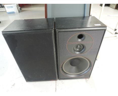 A pair of Jamo speaker cabinets, one loose