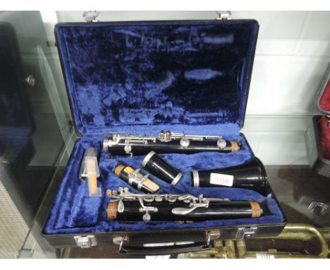 A cased clarinet, stamped serial numbers but no name, case B &amp; H so maybe Boosey and Hawkes