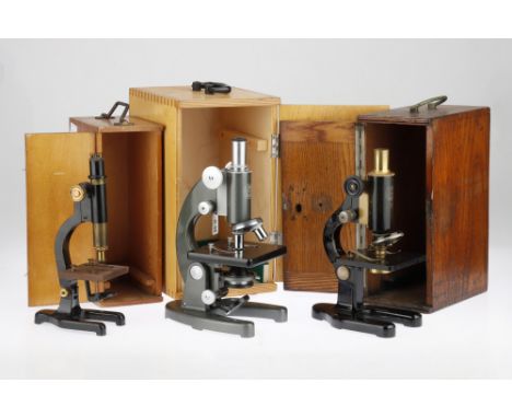 Collection of 3 Microscopes, including a brass and black lacquered microscope marked 'Luxima' in a case, a black and brass mi