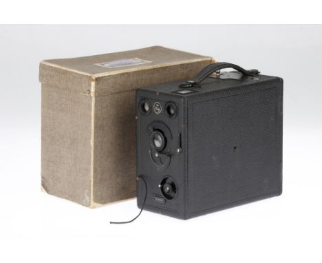 A Butcher &amp; Son No.0 Midg Magazine Camera, black, ¼ plate, body G-VG, shutter working, with a good number of plate holder