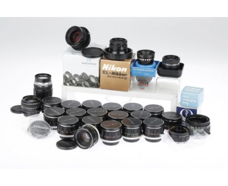 A Tray of Auto Soligor Camera Lenses and Various Enlarging Lenses comprising sixteen Auto Soligor f/1.8 50mm M42 mount lenses