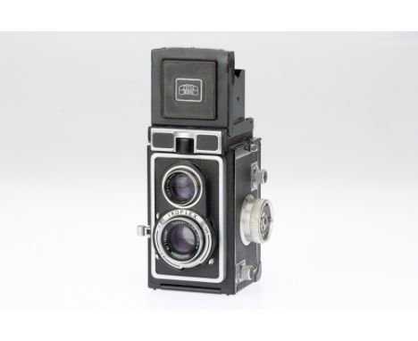 A Zeiss Ikon Ikoflex Ic Medium Format TLR Camera black, 1956-60, serial no.N10867, with a Carl Zeiss Tessar f/3.5 75mm lens, 