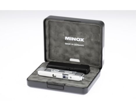 A Minox CLX Sub-Miniature Camera, 1998, chrome, serial no.1058, commemorating 60 years of Minox, engraved with line drawings 