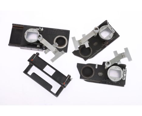 Three Leica Focussing Stage Attachments, all G cosmetic condition, with some light corrosion present, together with a mask ho