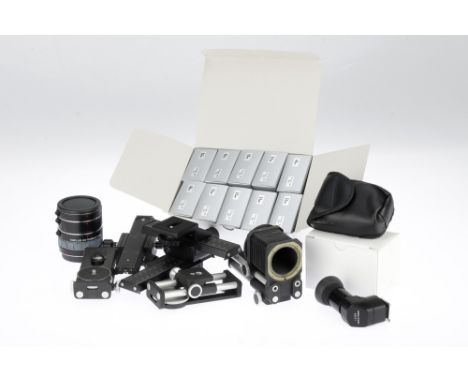 A Selection of Close Up and Macro Accessories including a small Novoflex bellows, two Novoflex focusing slides, a Soligor Mul