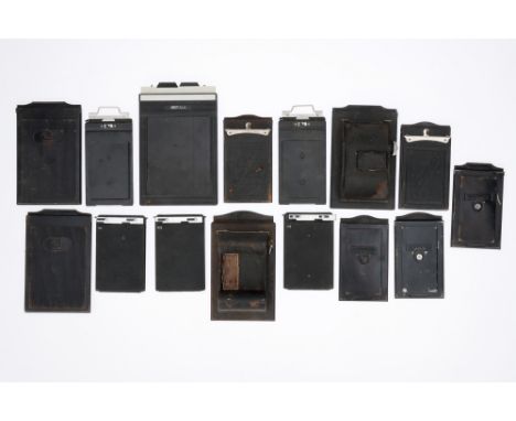 A Collection of Dark Slides and Roll Film Backs including a Rado and a Rollex roll film backs, a Fidelity Elite 4x5in. double