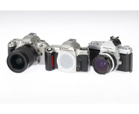 A Collection of Chrome Nikon 35mm SLR Cameras comprising a Nikkormat FTN camera with a Nikkor-H f/3.5 28mm lens, shutter work