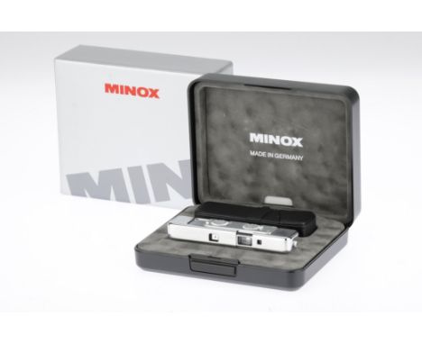 A Minox CLX Sub-Miniature Camera, 1998, chrome, serial no.1094, commemorating 60 years of Minox, engraved with line drawings 