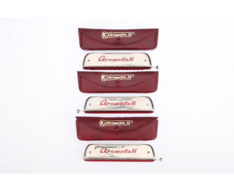 Three Hohner Aronetta 14 Harmonicas in maker's pouch cases with packaging, condition G