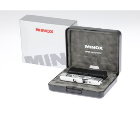 A Minox CLX Sub-Miniature Camera, 1998, chrome, serial no.1147, commemorating 60 years of Minox, engraved with line drawings 