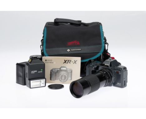 A Ricoh XR-X 35mm SLR Camera dark grey, 1987, serial no.25 186837, with a Sigma f/4.5 100-200mm lens, shutter untested, body 